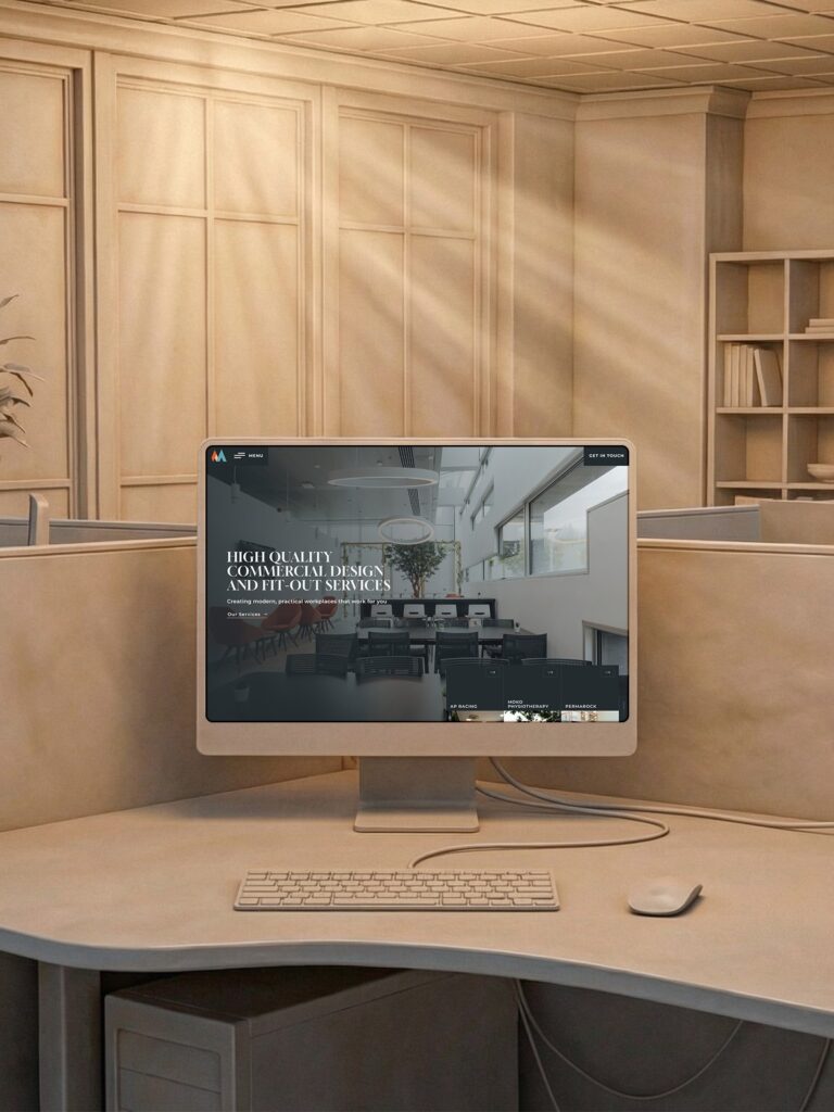 A 3:4 project archive preview of the Matthews Interiors homepage. The dark, premium layout designed by Good Launch highlights their commercial fit-out expertise through high-impact imagery and a sophisticated, structured aesthetic that invites exploration.